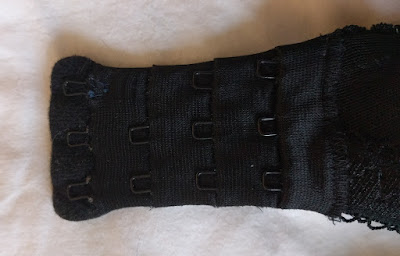 A damaged eye tape - the hooks are almost coming out of the material