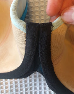 Close up of the inside of the gore, where loose threads can be seen.