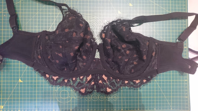 Longline bra laid flat to show elastic directly underneath the wires